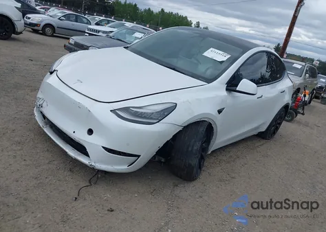 2021 Tesla Model Y Standard Range Rear-Wheel Drive из США, поврежденный, VIN 5YJYGDED9MF121828